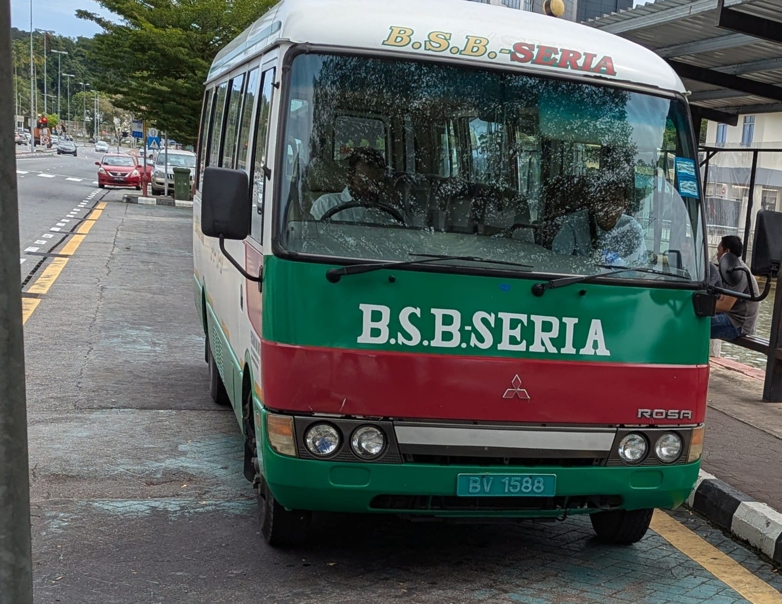 A local B.S.B.-Seria public bus at a stop in Brunei